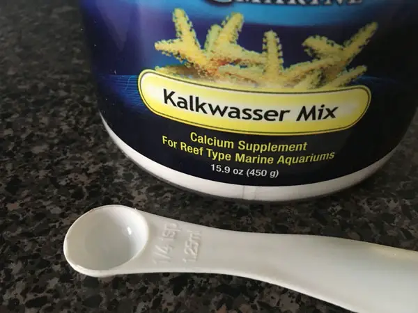 Kent marine mix brand kalkwasser mix with a 1/4 teaspoon for mixing with freshwater